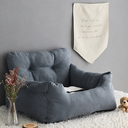 Dark Grey Passenger Nest pet car seat in a cozy home setting